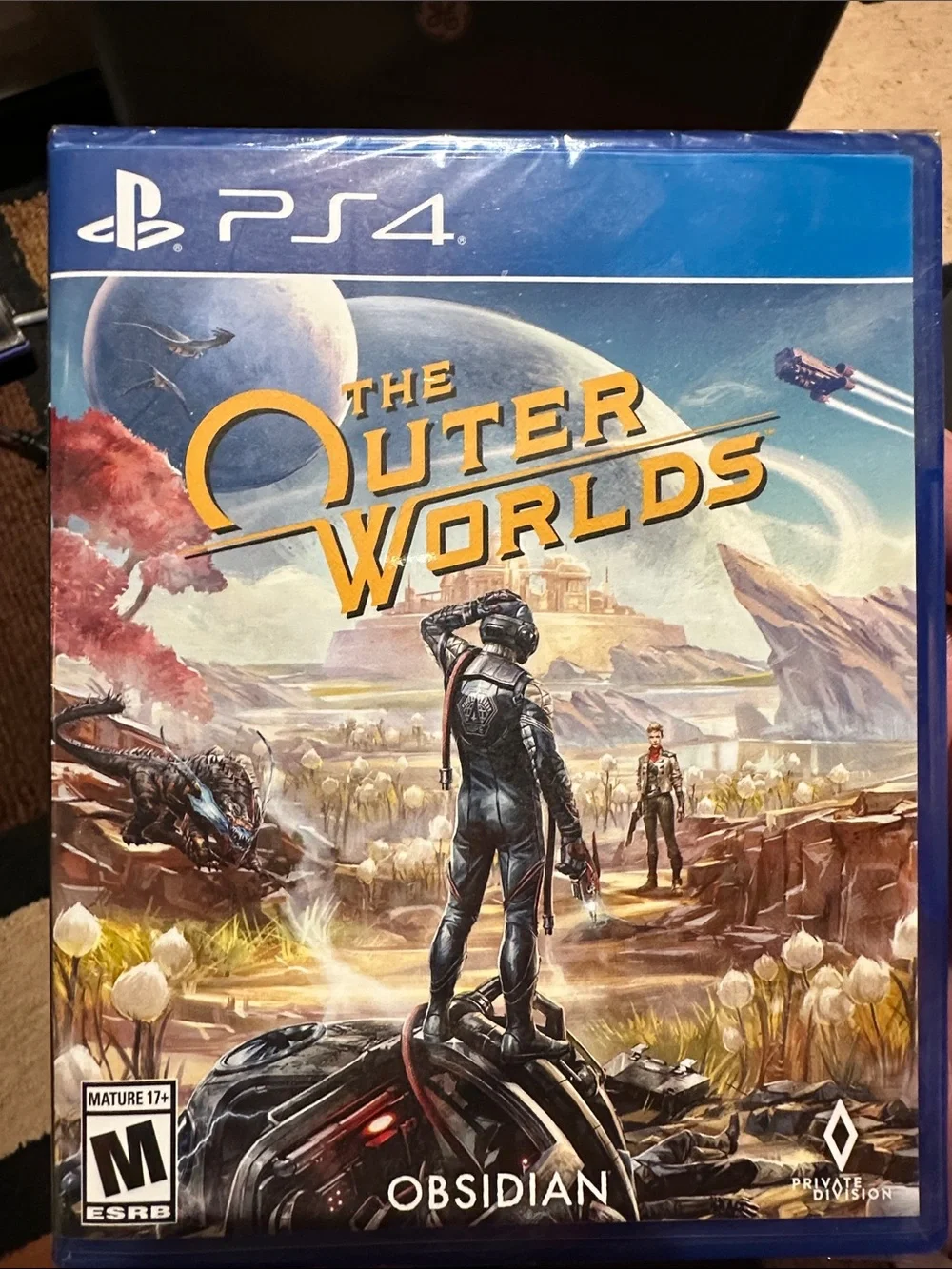 Sony PS4 The Outer Worlds - Blue Case with Yellow Logo Artwork